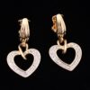 vintage gold tone rhinestone heart earrings clip on style