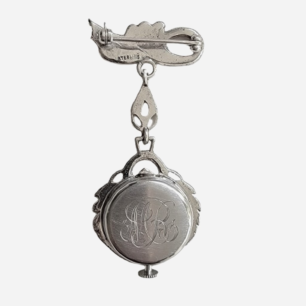 croton sterling marcasite accented wind up vintage lapel watch.