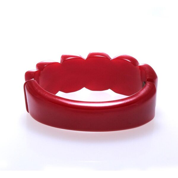 Red Bakelite vintage scallop carved design clamper bracelet