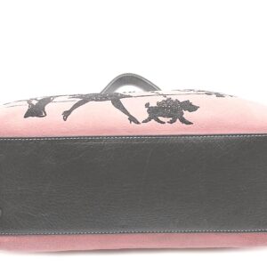 Isabella Fiore pink suede Handbag depicting a woman strolling through a park with a small dog on a leash.