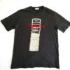 Dirty Denim black t-shirt with a faded, distressed graphic design on the front.
