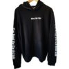 Front view of The Liz XX "What Do I Do" black graphic zip-up hoodie, unisex
