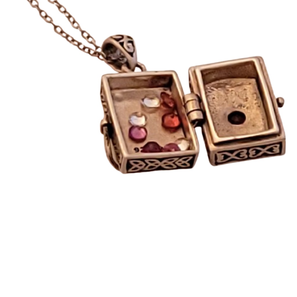 Open view showing gemstones inside box of BBJ Bangkok sterling silver gemstone shaker prayer box necklace